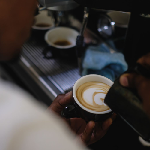 Barista is making latte art